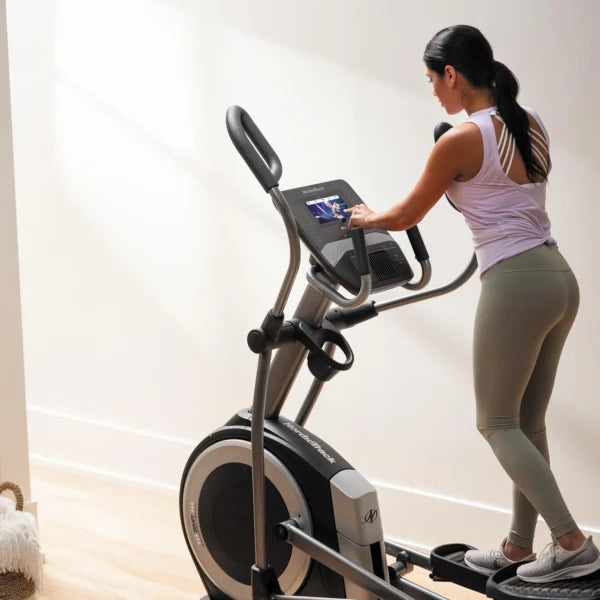 nordictrack_commercial_9.9_elliptical_cross_trainer_nordictrack_commercial_9.9_elliptical_cross_trainer_-transport_wheels_-_lifestyle-600x600